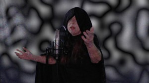 picture from fuzzy video, me wearing a cape